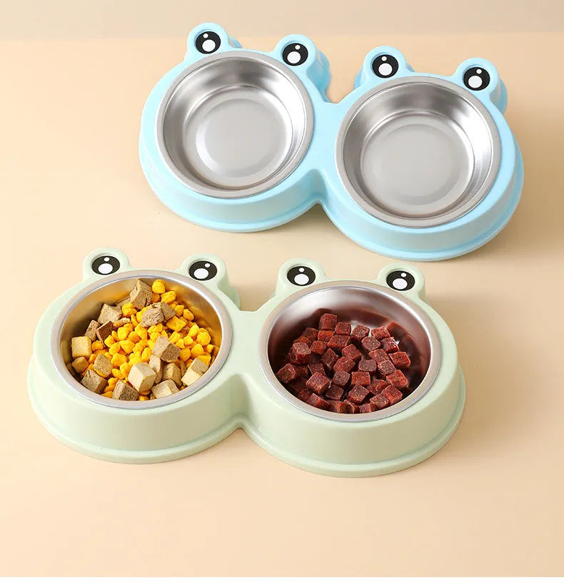 Blue double compartment pet feeding bowl with stainless steel frog-shaped water bowl attached.