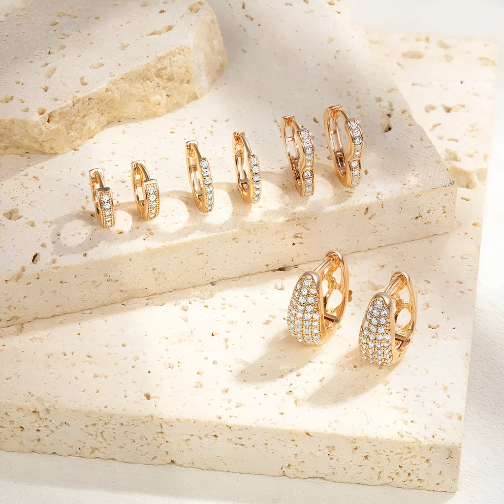 Brass gold-plated heart-shaped ear clip earrings with gang drill detailing and electroplated finish