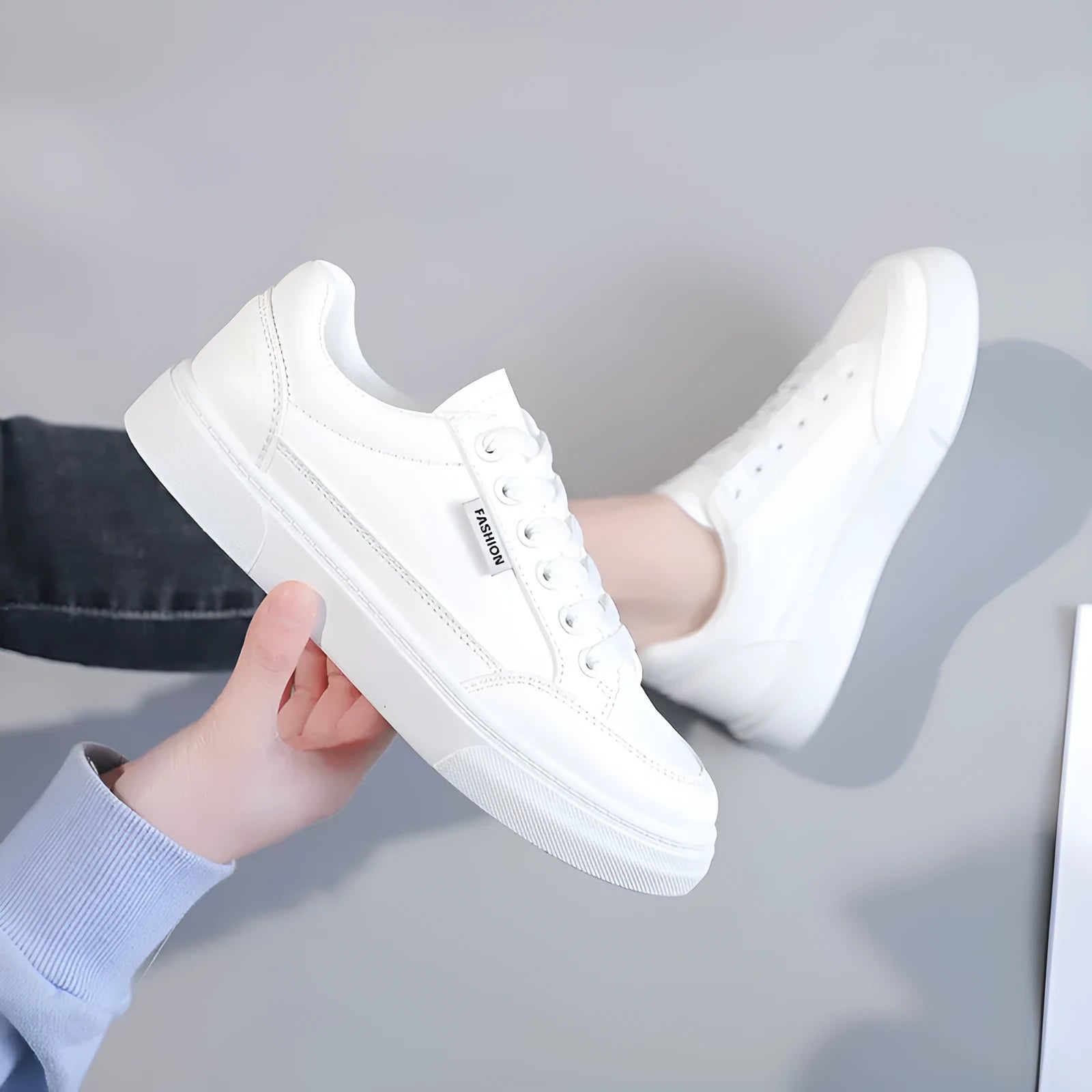 Korean-style low-top sneakers in white and brown with artificial PU leather upper and plastic sole