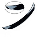 Large bright black tail blade spoiler for a Mazda 3 Axela car, showing wind-surrounded design.