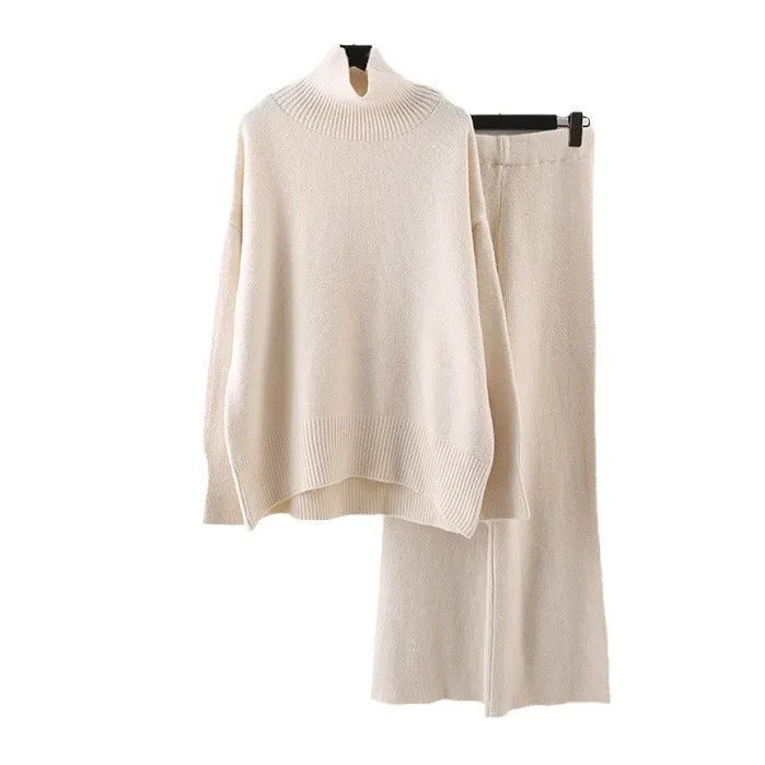 Women's casual two-piece set with long sleeve sweater and wide leg trousers in a solid colour.