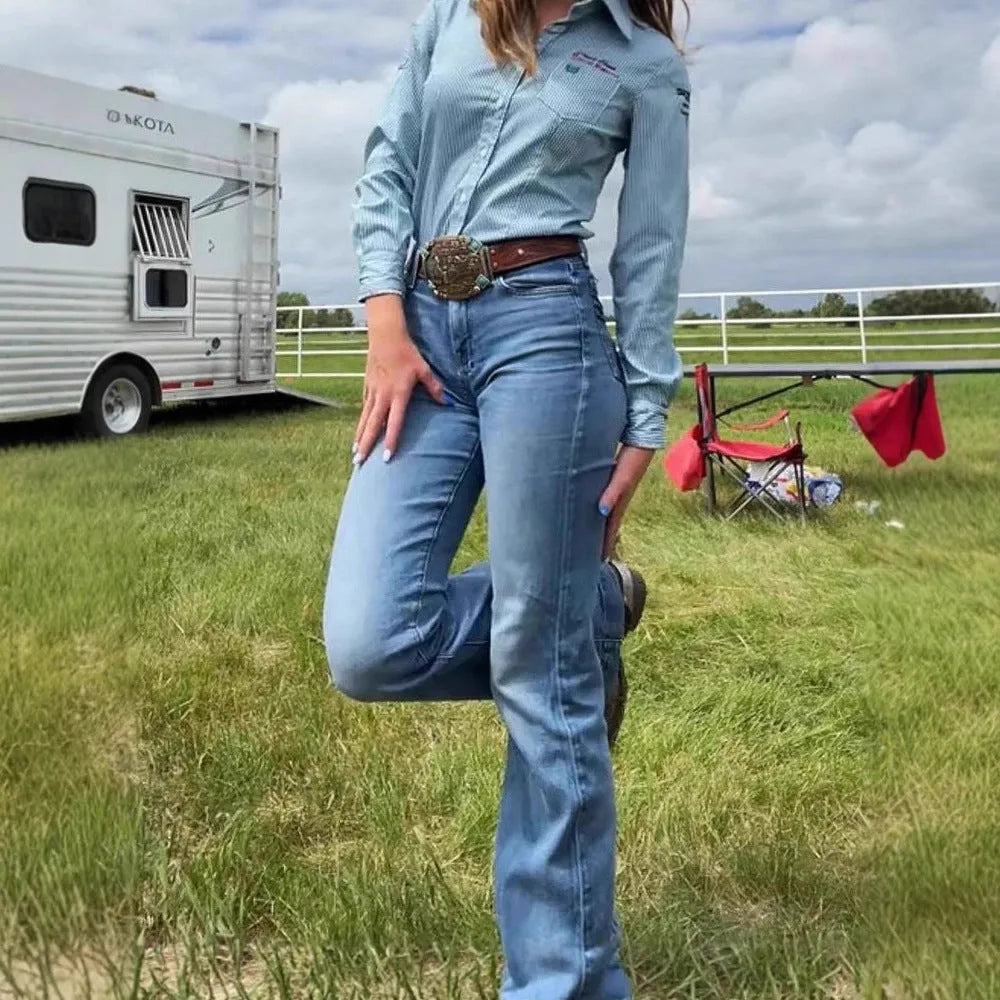 Women's slim fit jeans with elastic mid-waist, flared leg, and embroidered detail.