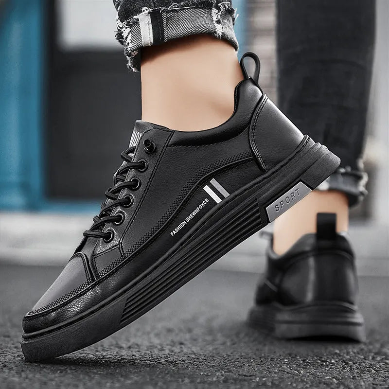Men's black and white low-top skate shoes with elastic band and rubber soles