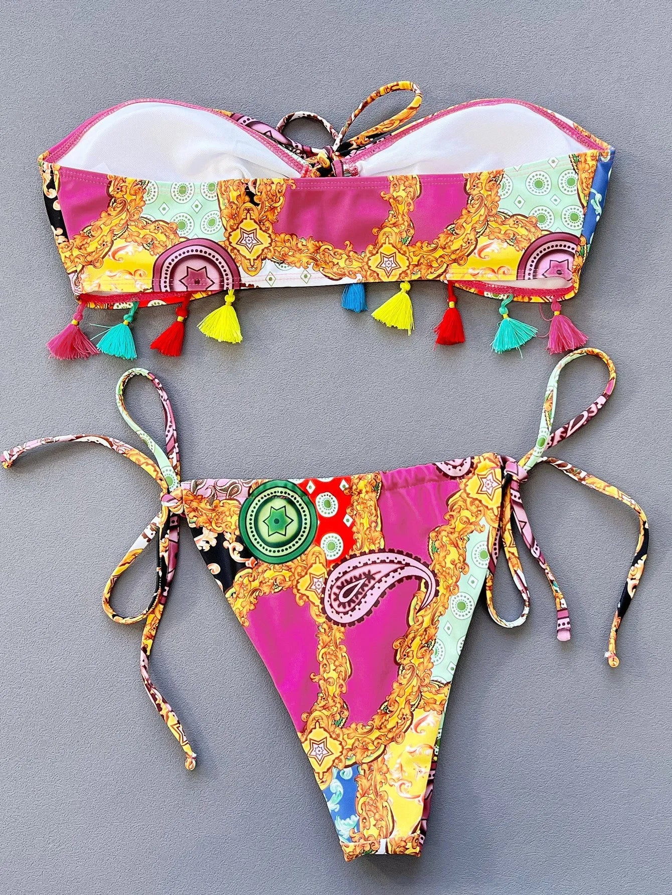 Women's separated bikini set with printed tube top and briefs on a mannequin