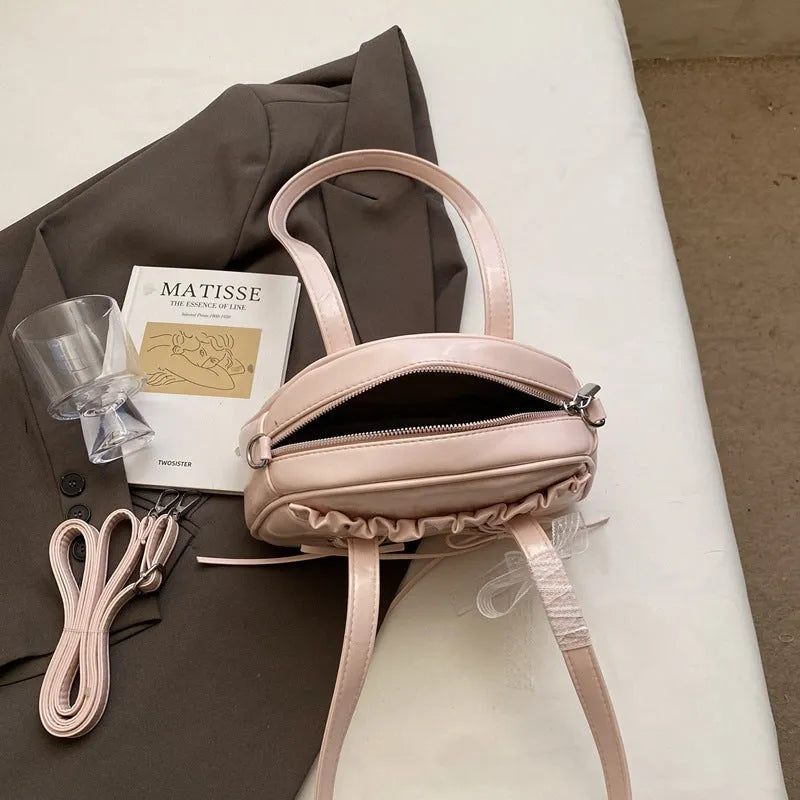 Ladies bandage bow shoulder handbag in PU leather with mobile phone pocket interior