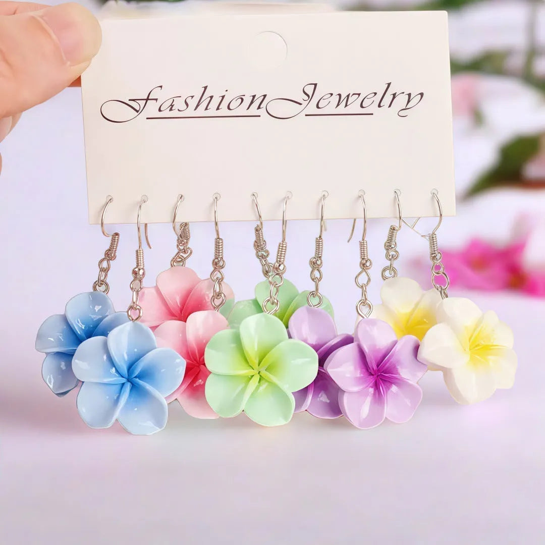 Handmade Plumeria Rubra resin earrings in eight colours including blue and pink, lightweight floral design for pierced ears