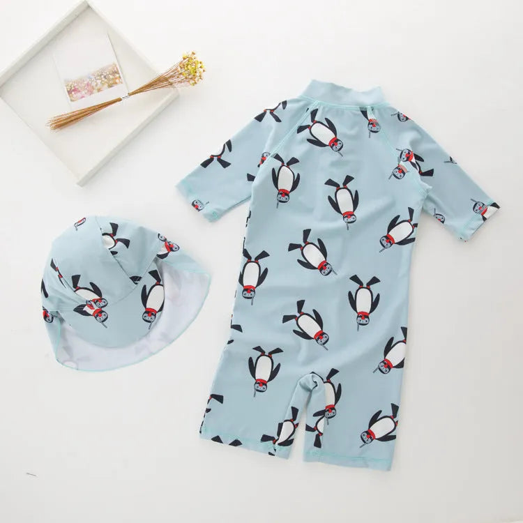 Boys' long sleeve penguin print swimsuit two-piece set with matching swimming cap
