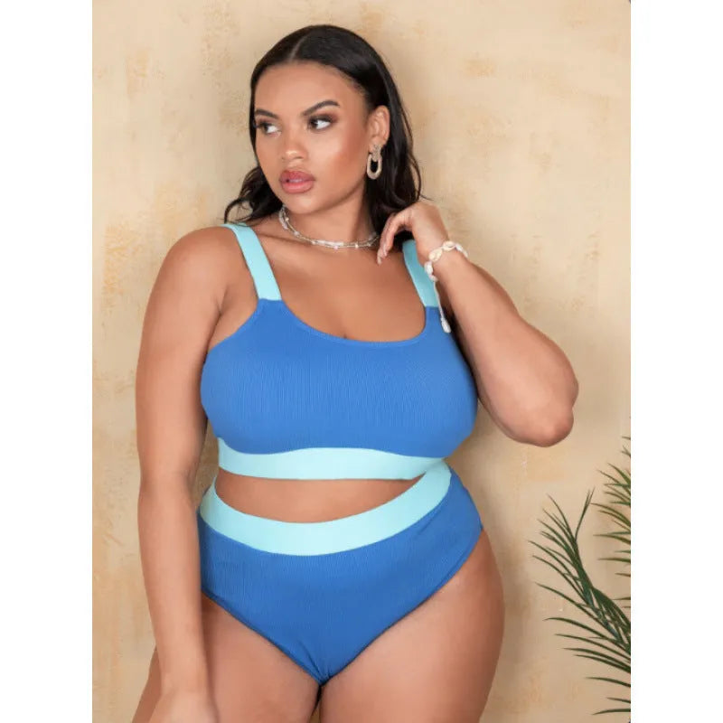 Women's solid colour high-waist polyester bikini brief suit with a side split detail.
