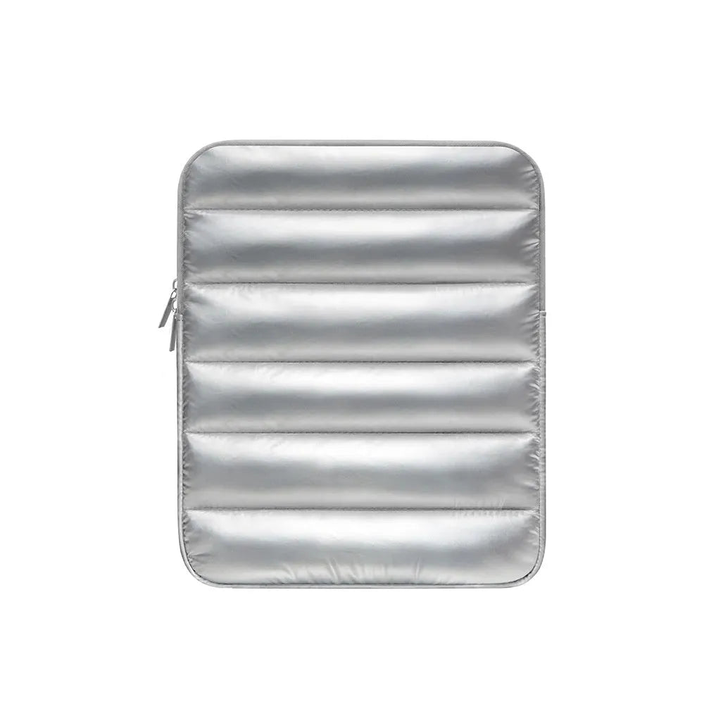 Black elastic puff bag laptop sleeve for 9.7 to 11 inch devices on a table