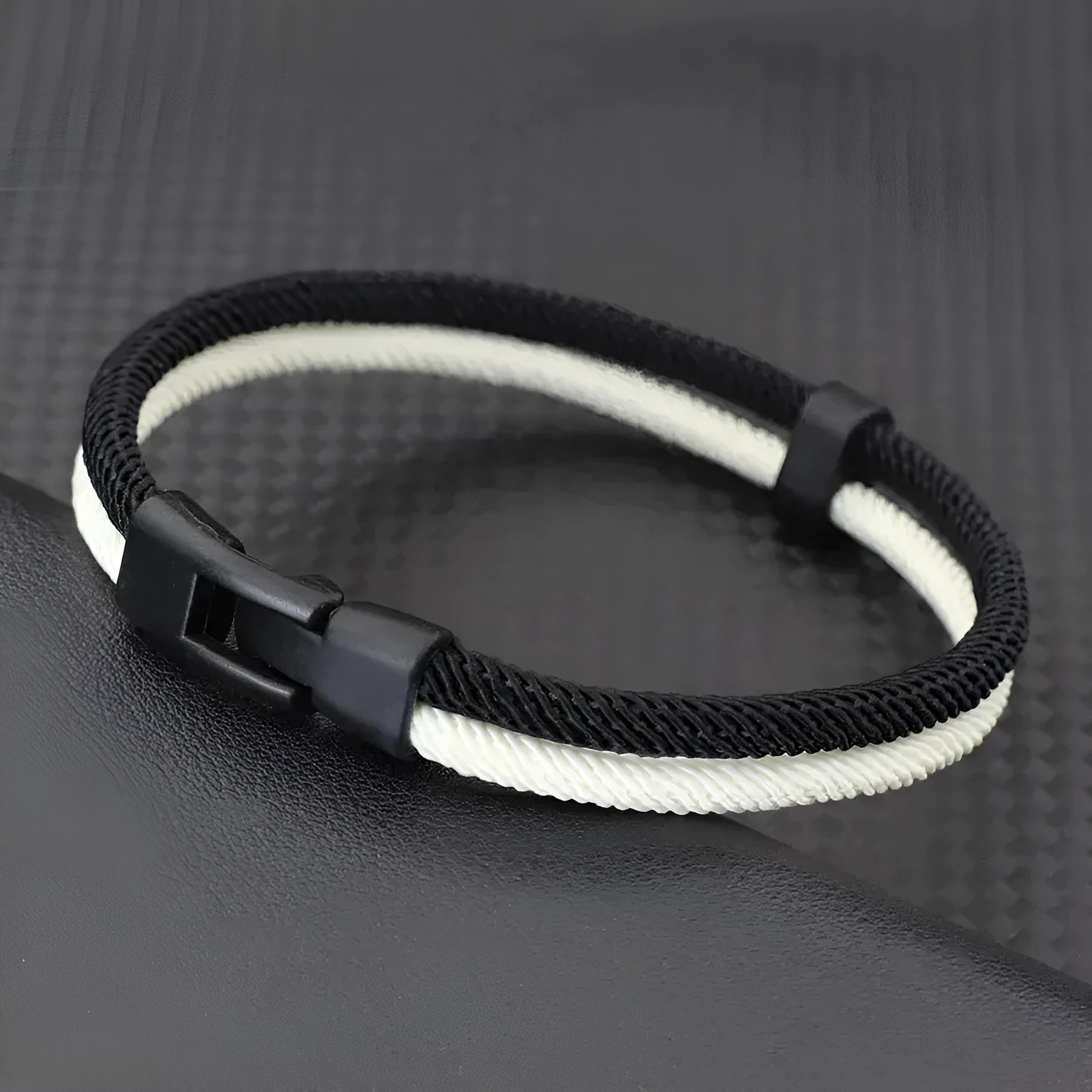 Black and white woven Milan rope alloy hand strap showing textured construction and length options