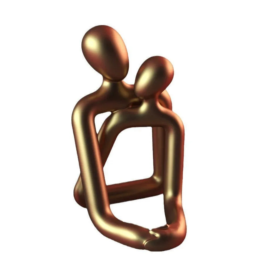Modern resin sculpture of an embracing couple, available in milky white or gold, for shelf or desk decor.